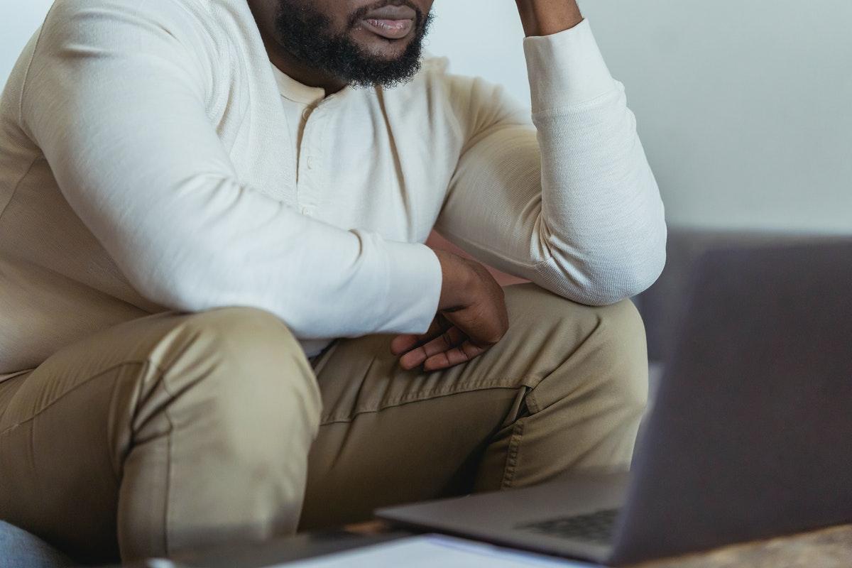 Tired Man Sitting